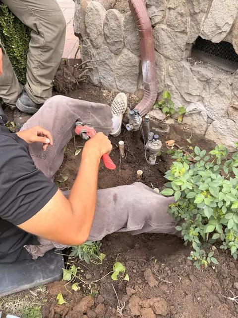 Tightening a fitting on a new valve (ACRE job photo)
